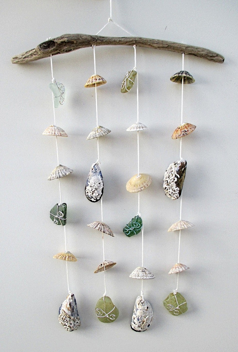 http://www.iconhomedesign.com/diy-wind-chimes-ideas-to-create-beautiful-decoration.html/diy-seashell-wind-chimes